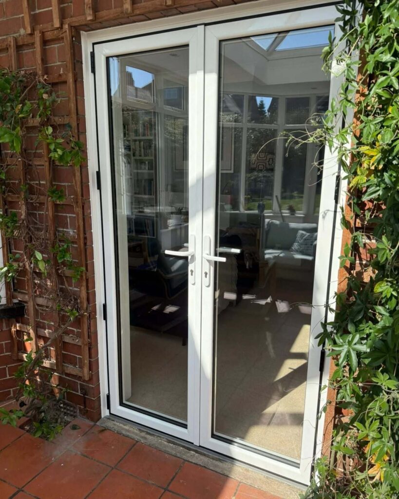 Smart Systems aluminium French doors in anthracite installed by Northumbrian Windows