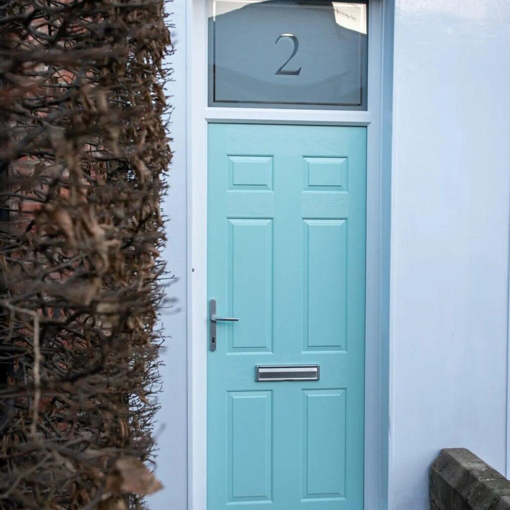 Duck egg blue composite front doors with chrome furniture