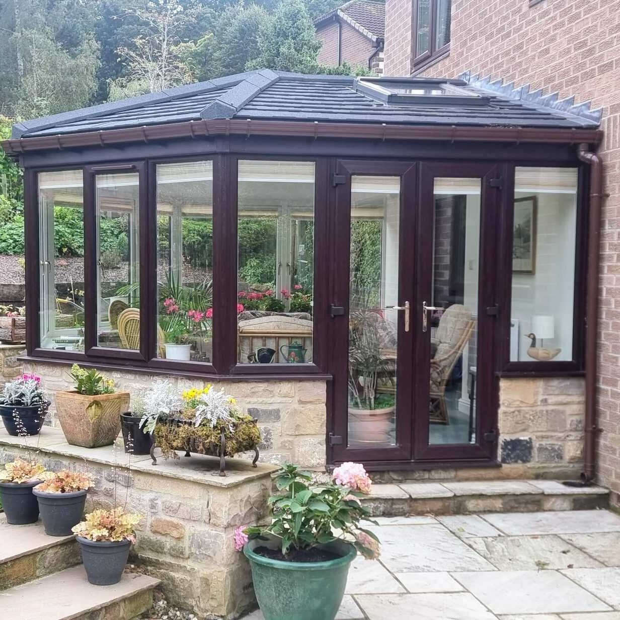 Victorian-style conservatory sunroom with warm roof finished by Northumbrian Windows